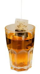 closeup tea bag in a transparent tea cup, black tea in tall glass isolated on white background. 
