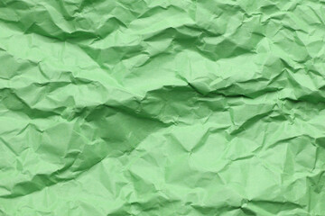Crumpled green paper background texture