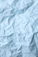 Obraz premium Crumpled blue paper background. Natural texture