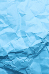 Crumpled blue paper background. Natural texture