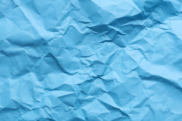 Crumpled blue paper background. Natural texture