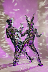 Mirror dancers performing on purple stage with confetti