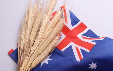 Ears of wheat with Australia flag. Trade export and economy, grain deal and world food security...