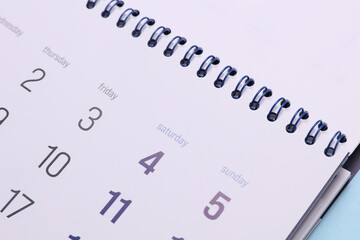 Paper calendar planner close up. Holiday, business concept