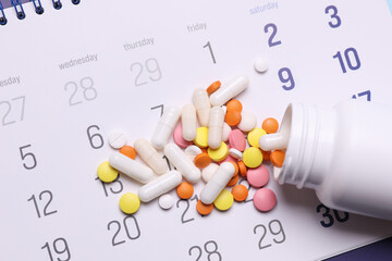 Paper calendar planner with pills. Medicine and health care, treatment concept