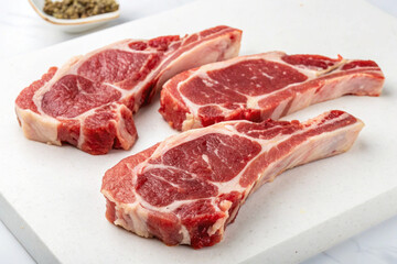 Obraz premium Sliced lamb meat, white background