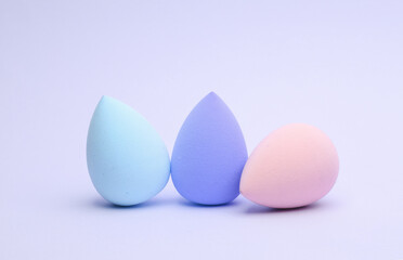Make-up sponges, cosmetic blenders on white background. Beauty products.