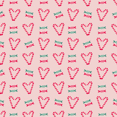 A charming and festive seamless pattern featuring repeating red and white candy canes forming heart shapes