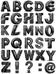 : High-contrast black alphabet letters featuring bold tire tread textures, dynamic strokes, and detailing, creating an industrial and rugged design theme for creative typography project