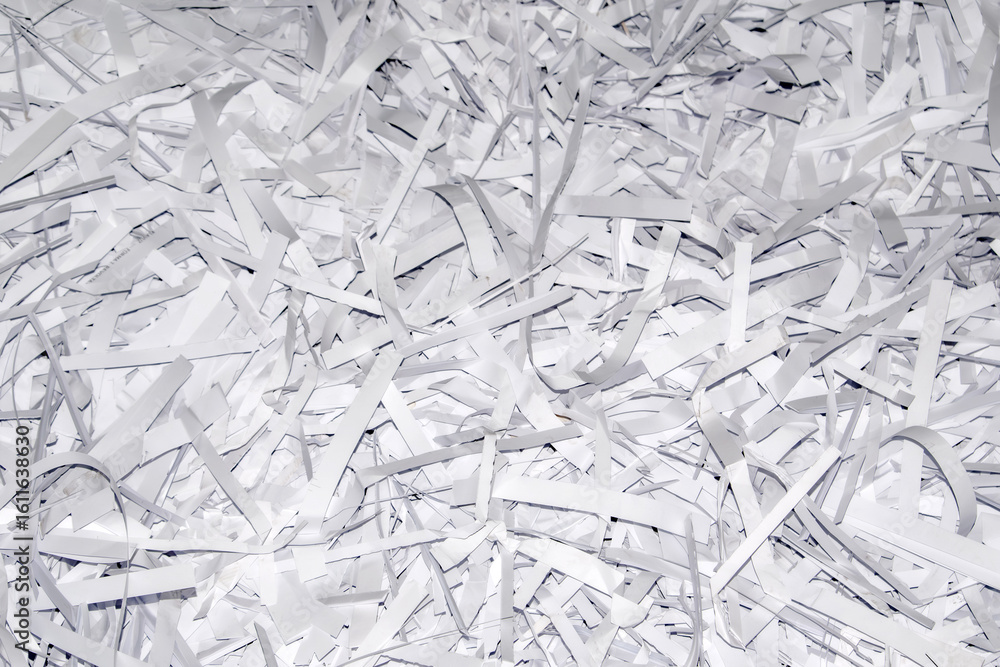 Poster close-up of finely shredded scrap white paper. creating a chaotic yet artistic texture. perfect for 