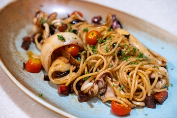 Squid spaghetti served on plate