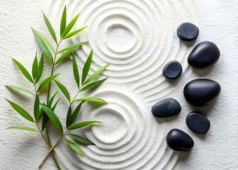 Fototapeta premium Black zen stones and green bamboo leaves on raked white sand