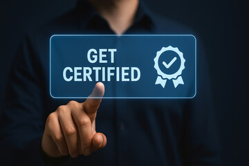 Professional man pressing futuristic glowing get certified button with digital badge icon in modern business technology certification concept
