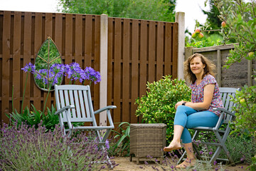 Mirror by the Agapanthus.