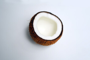 Single Whole Coconut with Shadow on White
