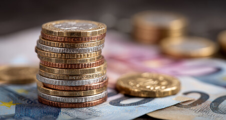 Gold coins stacked on the euro