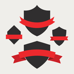 Collection of Black Shield and Red Ribbon Badges for Award or Achievement