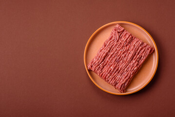 Raw ground beef meat food, ingredient for making cutlets or meatballs. Raw ground beef