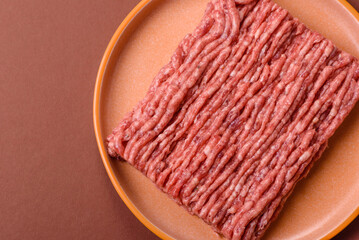 Raw ground beef meat food, ingredient for making cutlets or meatballs. Raw ground beef