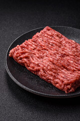 Raw ground beef meat food, ingredient for making cutlets or meatballs. Raw ground beef