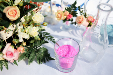 Colorful Wedding Sand Ceremony with Fresh Flower Decor