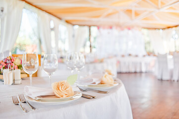 Elegant Table Setting at a Wedding Reception Venue with Decorative Details