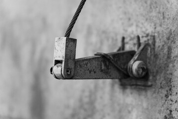 Old Polish military equipment showcasing a metal pulley system with worn, rustic features