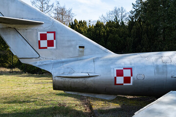 Exploration of old Polish military equipment on display in a green park during a sunny afternoon