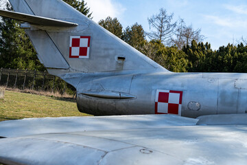 Old Polish military aircraft preserved in outdoor display for historical appreciation and education
