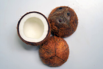 photo concept of coconut on a white table