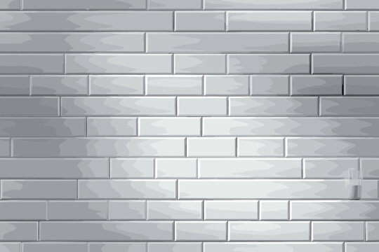 Gleaming gray and white subway tiles form a clean, modern wall, creating a textured and reflective surface.