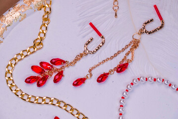 Beautiful handmade necklace and braclet on background
