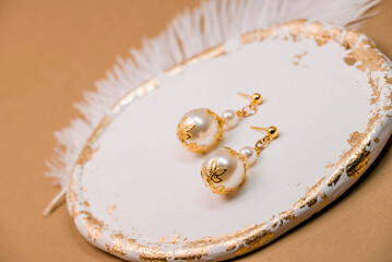 Beautiful handmade necklace and braclet on background