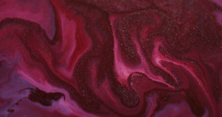 Spatter texture. Spreading ink particles. Defocused red blue color wet shiny bright liquid splash...