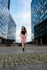 Portrait of beautiful young model in city center