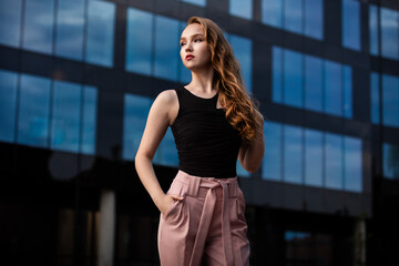 Portrait of beautiful young model in city center