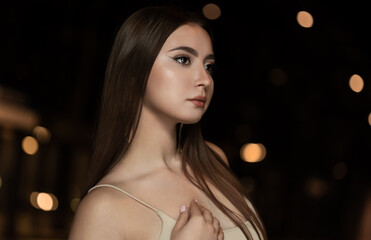 Portrait of beautiful young model at city center