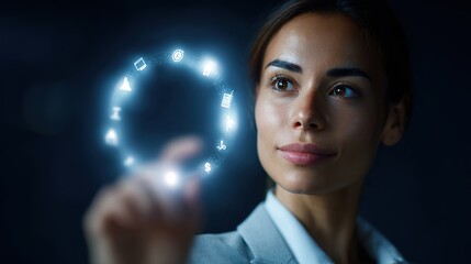 Young Businesswoman Interacting with Digital Icons in Dark Setting