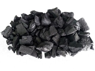 Natural wood charcoal is traditional charcoal made using hardwood isolated on a white background....