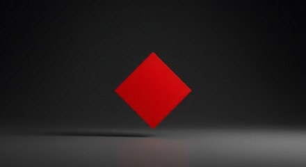 A red diamond shape floating in a dark grey studio with a soft shadow below and a simple background