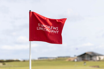 flag of the St. Andrews links trophy on the old golf course in Scotland