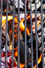Burning wood and fire flames. Empty hot charcoal barbecue grill with bright flame