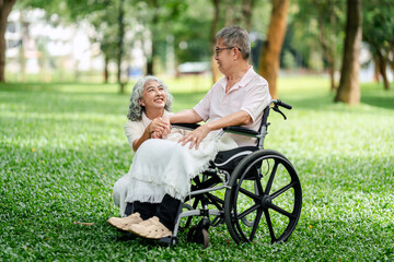 Elderly couple showing enduring love mutual support in a tranquil green park enjoying peaceful outdoor moments for wellbeing and lasting happiness