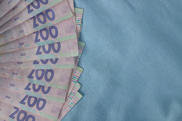 money cash close up on blue background