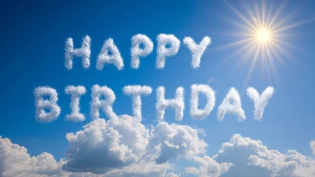 Cloudy sky with text 'Happy Birthday' formed by fluffy clouds and bright sun shining above