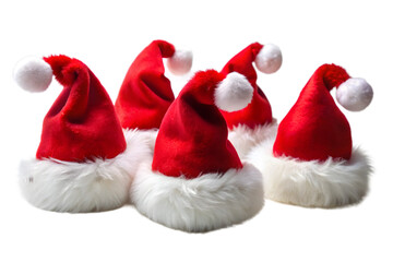 A festive collection of five red santa hats with white fluffy trim and pompoms, isolated on a transparent background