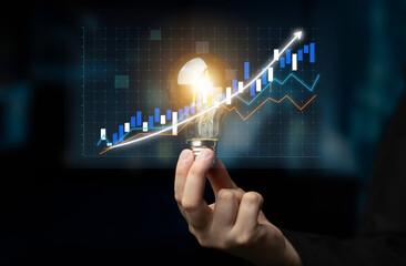 A visual representation of innovation and financial growth, featuring a light bulb and a stock market graph, symbolizing business creativity and success strategies. Impute