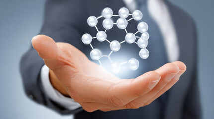Professional hand holding glowing molecular network structure. Digital chemistry visualization represents biotechnology, pharmaceutical research, scientific innovation. Modern healthcare technology