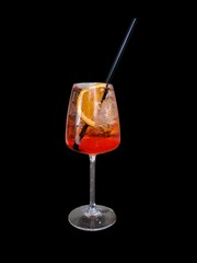 close-up of a spritz long drink on a black background