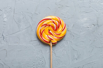 Set of colorful lollipops on colored background. Summer concept. Party Happy Birthday or Minimalist...